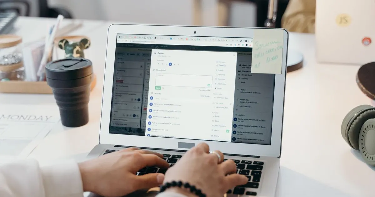 A project management tool open on a laptop